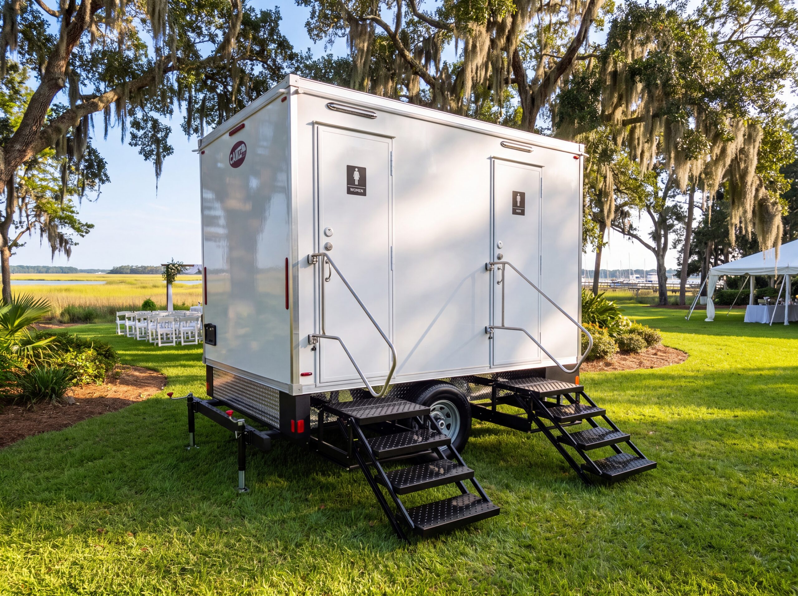 Luxury 2-stall restroom trailer set up at an outdoor event venue in Charleston, SC with private entrances and premium amenities.